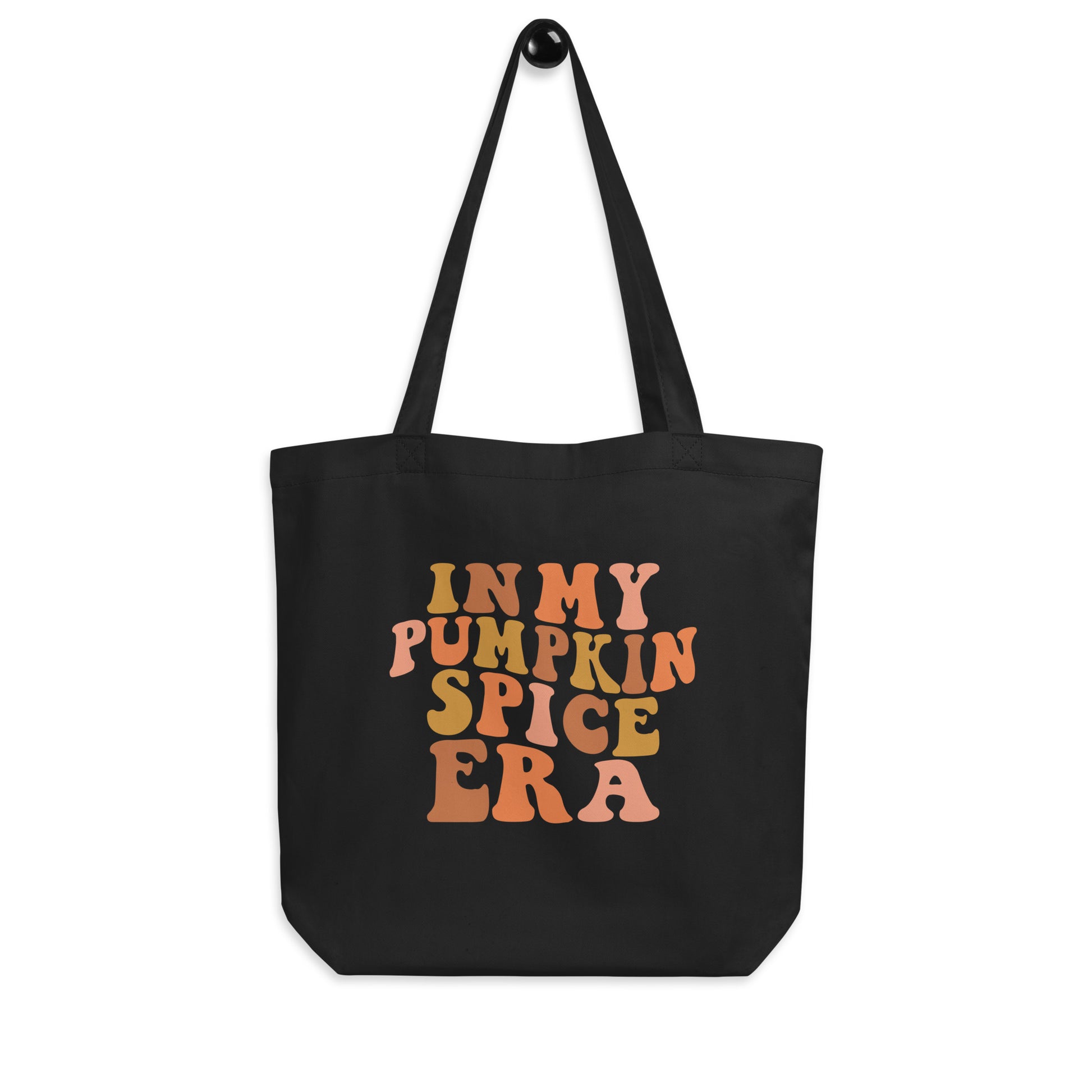 Black cotton tote bag that says "In My Pumpkin Spice Era"